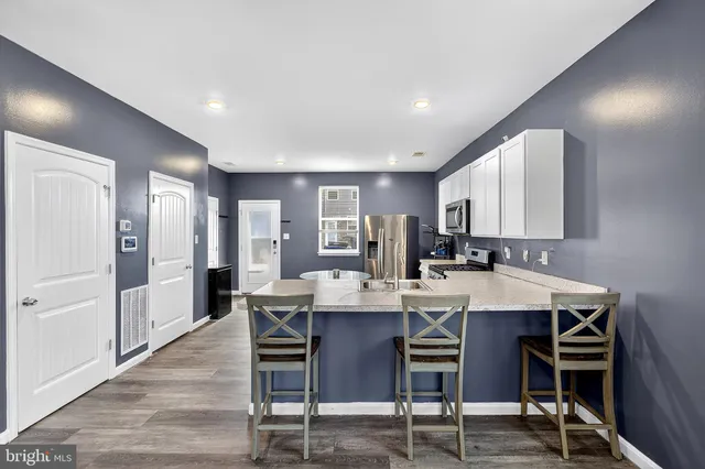 a view of a dining room with furniture