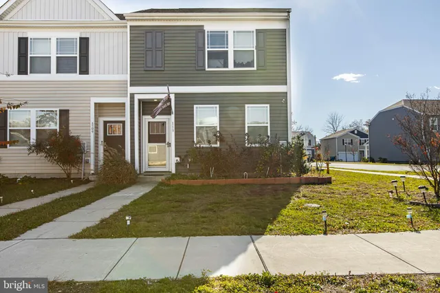 a view of a house with swimming pool