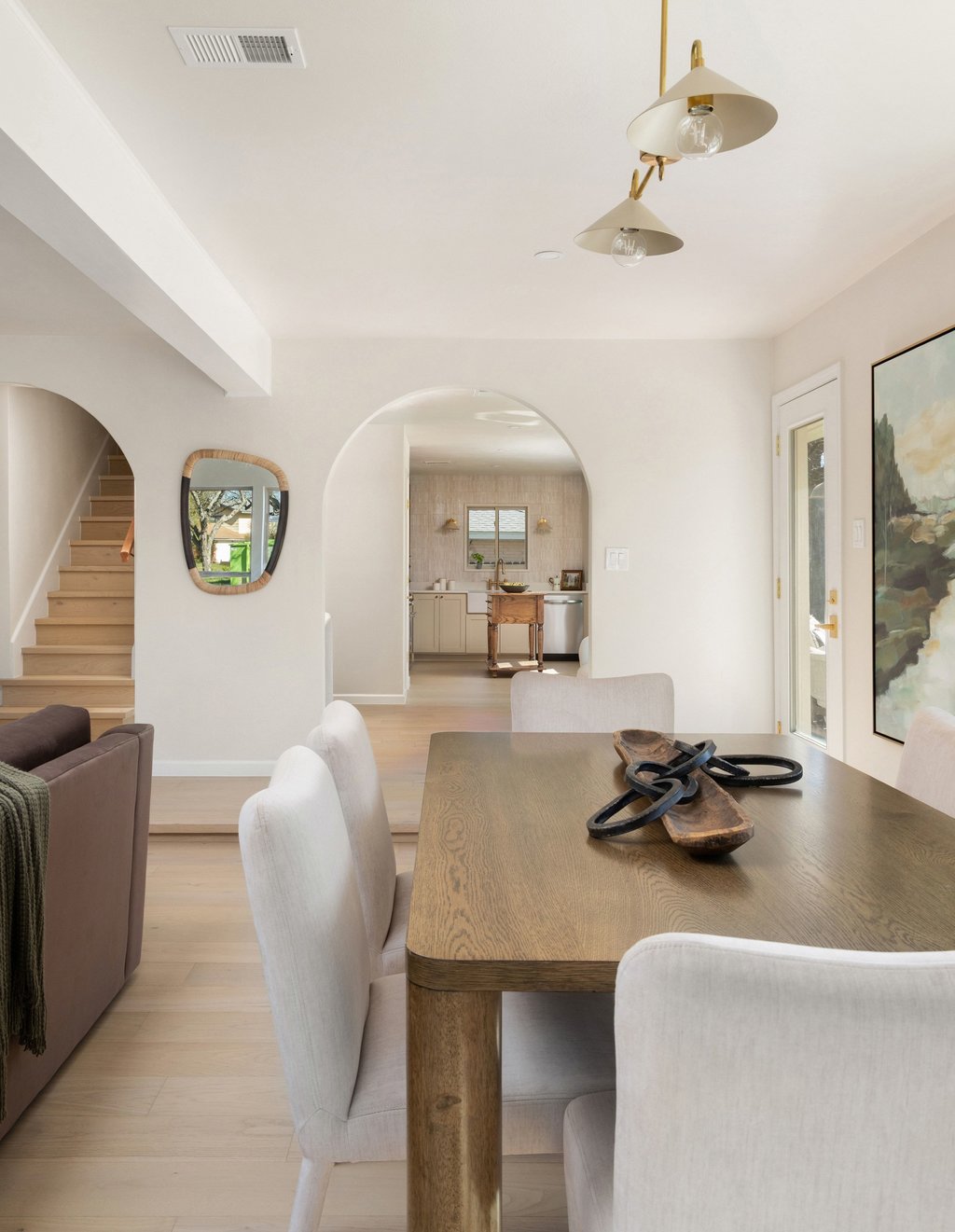 5213 Buffalo Pass Austin, TX 78745 - Photo 13 of 26 Dining area framed by natural light and designer finishes, all open to the living and kitchen spaces.