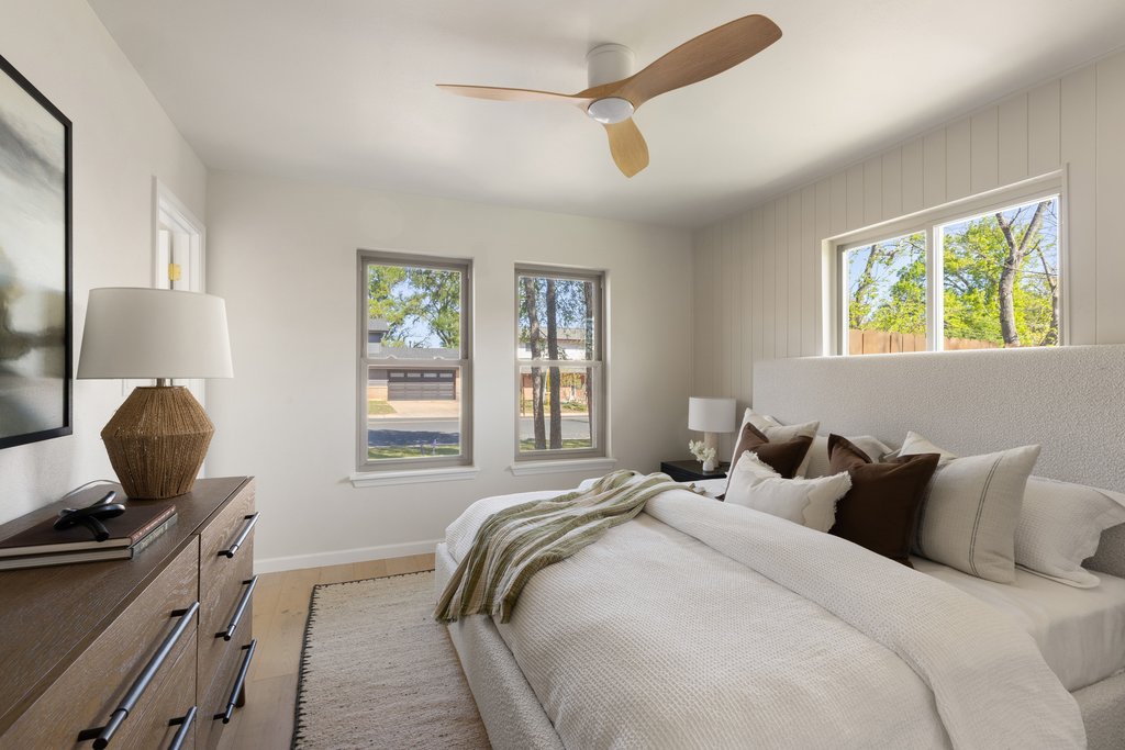 5213 Buffalo Pass Austin, TX 78745 - Photo 14 of 26 Serene main-level primary suite with soft, natural light and warm soft colors.
