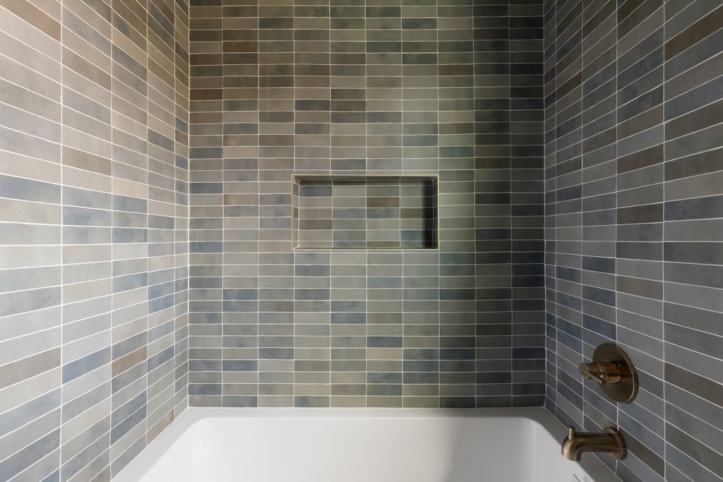 5213 Buffalo Pass Austin, TX 78745 - Photo 20 of 26 A well-appointed guest bathroom with a modern edge, yet simple and elevated.