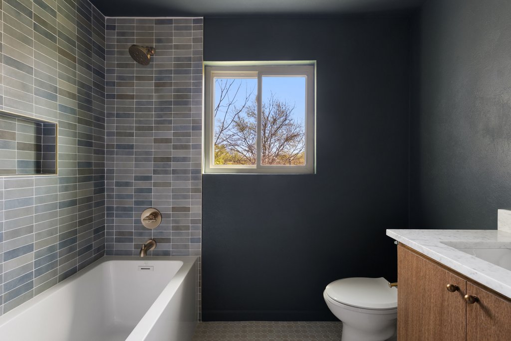 5213 Buffalo Pass Austin, TX 78745 - Photo 21 of 26 Thoughtfully designed guest bathroom shared by the 2 secondary bedrooms.