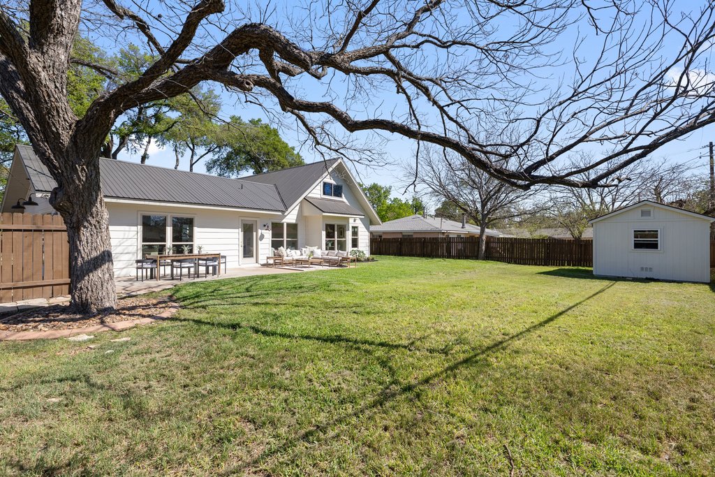 5213 Buffalo Pass Austin, TX 78745 - Photo 25 of 26 Private yard framed by mature trees, and space for growth - think ADU, pool, or sports court.