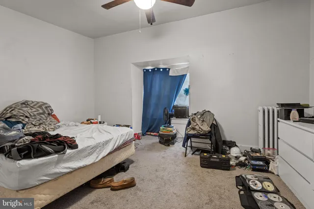 a room with a window and gym equipment