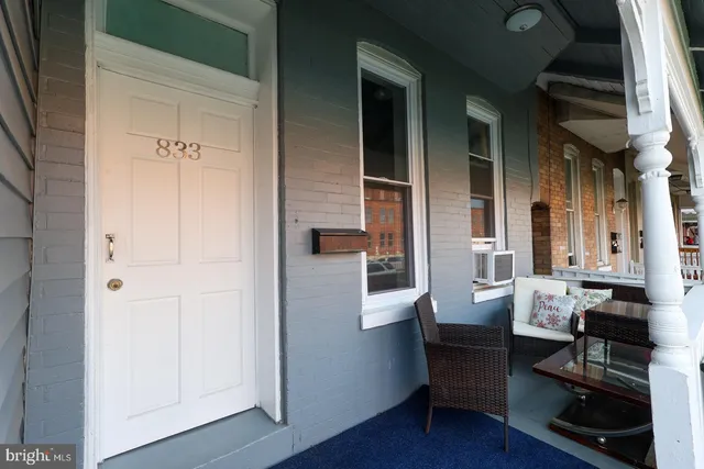 a room with furniture and wooden floor