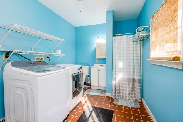 a utility room with dryer and washer