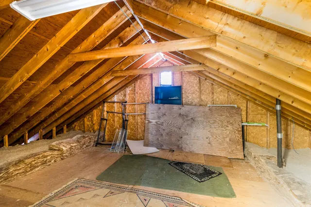 a view of a house with a yard porch and sitting area