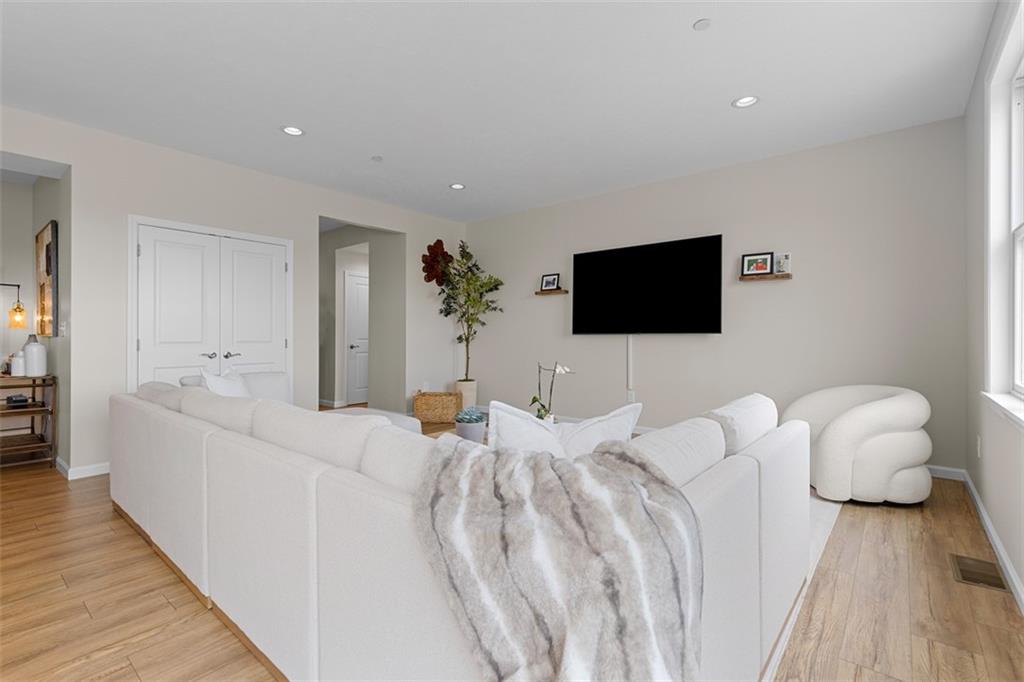 403 Walnut Court Pittsburgh, PA 15237 - Photo 11 of 42 a living room with furniture and a flat screen tv