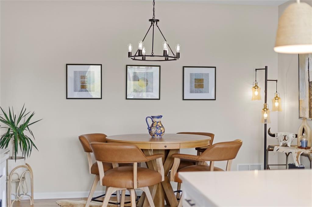 403 Walnut Court Pittsburgh, PA 15237 - Photo 18 of 42 a view of a dining room with furniture and wooden floor