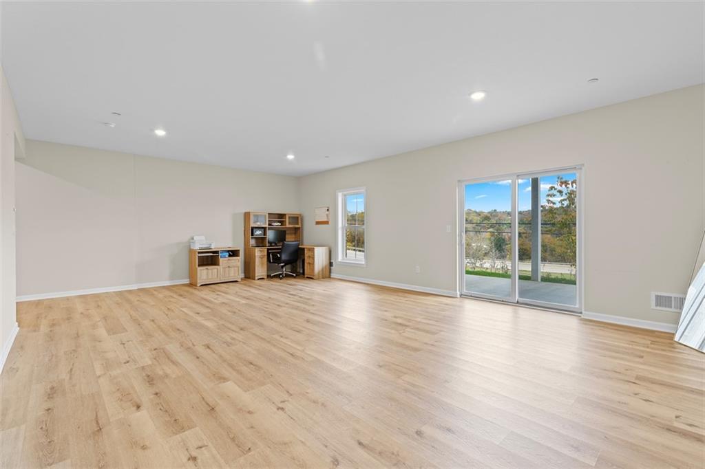 403 Walnut Court Pittsburgh, PA 15237 - Photo 25 of 42 a view of empty room with wooden floor and window