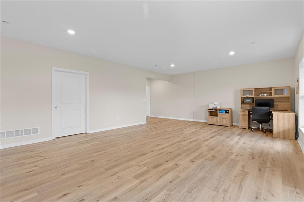 403 Walnut Court Pittsburgh, PA 15237 - Photo 26 of 42 a view of empty room with wooden floor and furniture