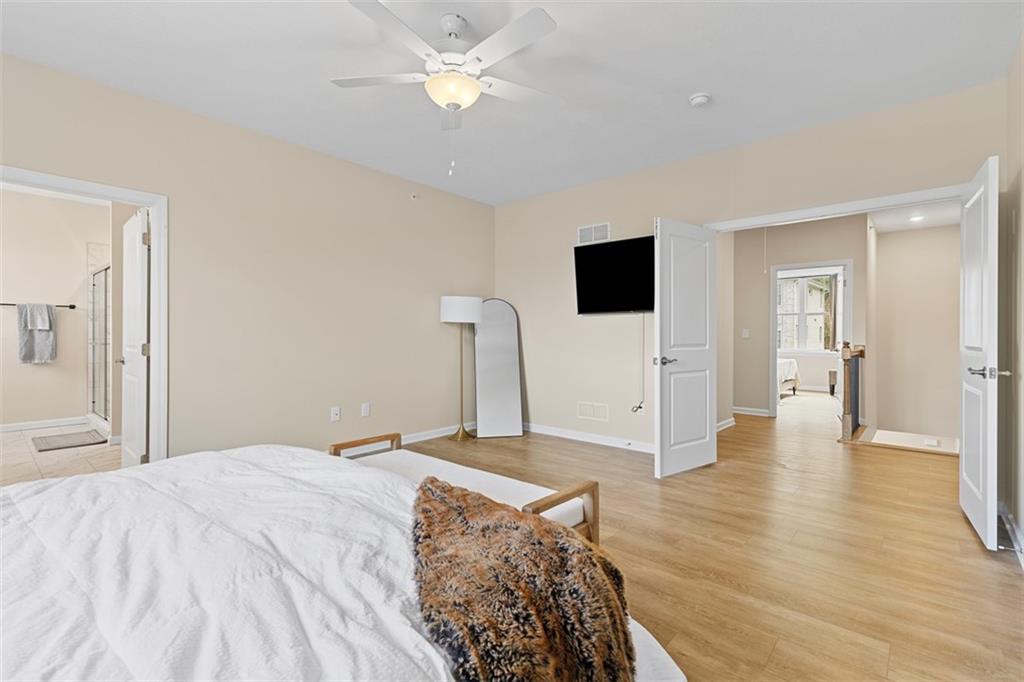 403 Walnut Court Pittsburgh, PA 15237 - Photo 30 of 42 a bedroom with a bed and a flat screen tv