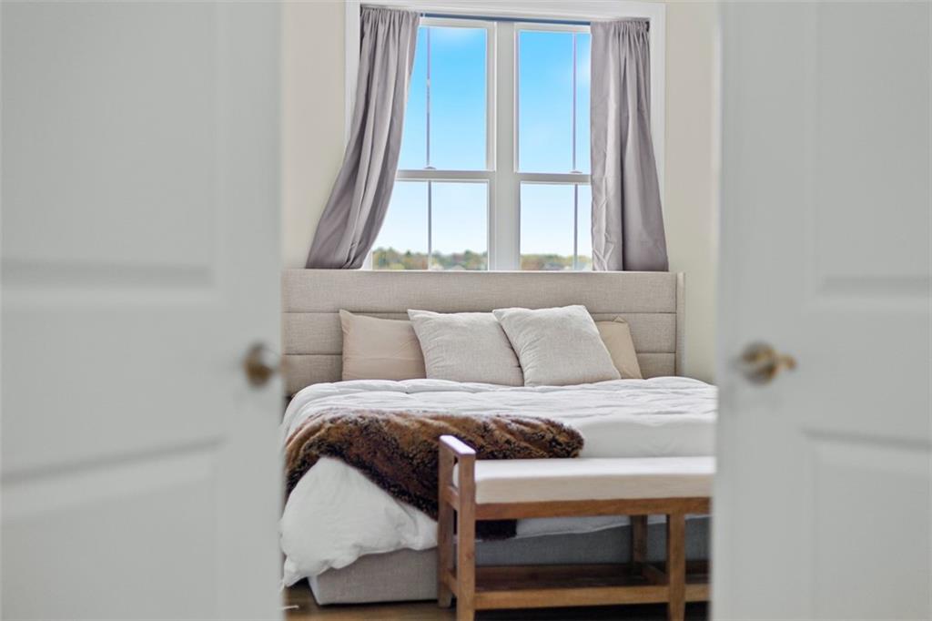 403 Walnut Court Pittsburgh, PA 15237 - Photo 31 of 42 a bedroom with a bed and window