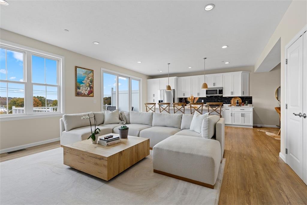 403 Walnut Court Pittsburgh, PA 15237 - Photo 9 of 42 a living room with furniture and kitchen view