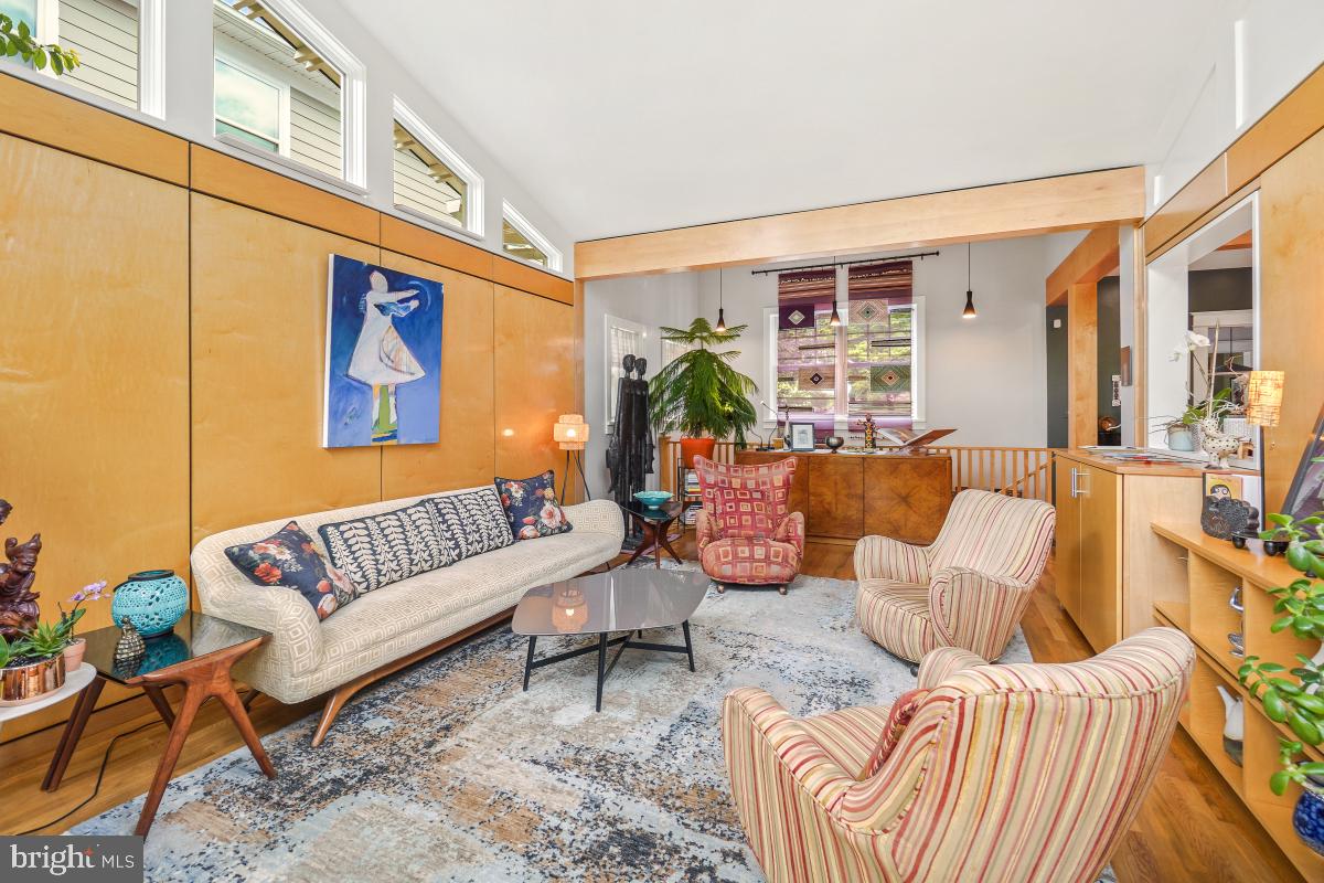 749 Silver Spring Avenue Silver Spring, MD 20910 - Photo 4 of 55 a living room with furniture and a potted plant
