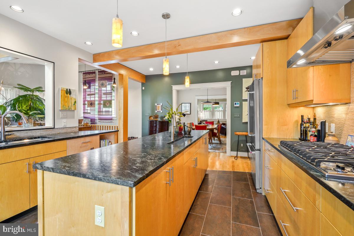 749 Silver Spring Avenue Silver Spring, MD 20910 - Photo 8 of 55 a large swimming pool with a large window and chandelier