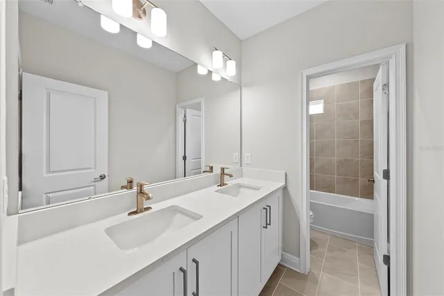 a bathroom with a sink a vanity and a mirror