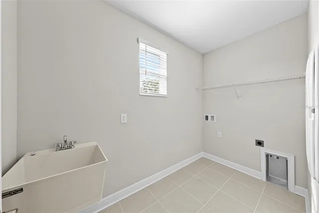 a bathroom with a bathtub and sink