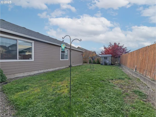 a backyard of a house with lots of green space