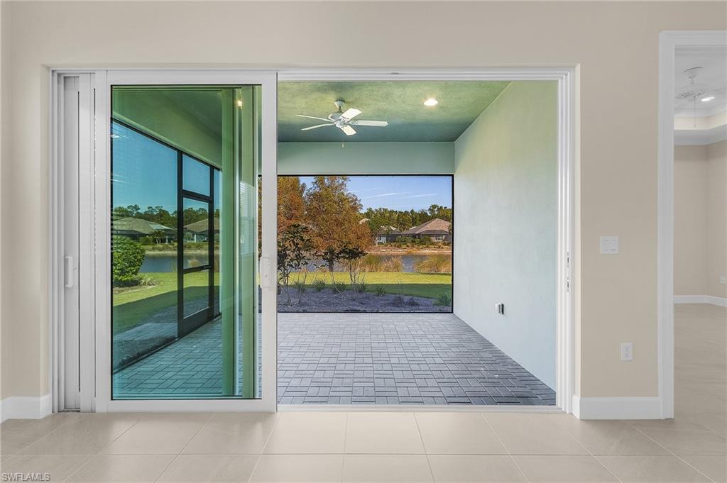 5731 Highbourne Drive Naples, FL 34113 - Photo 14 of 20 Lanai featuring ceiling fan