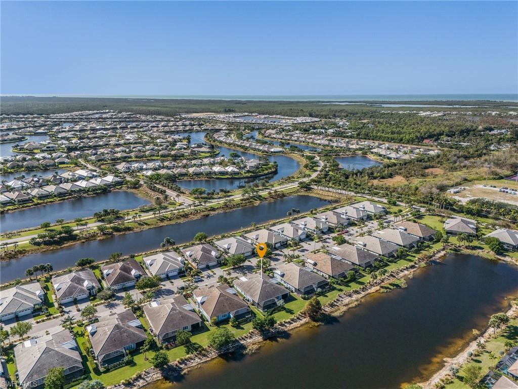 5731 Highbourne Drive Naples, FL 34113 - Photo 18 of 20 Birds eye view of property with a water view