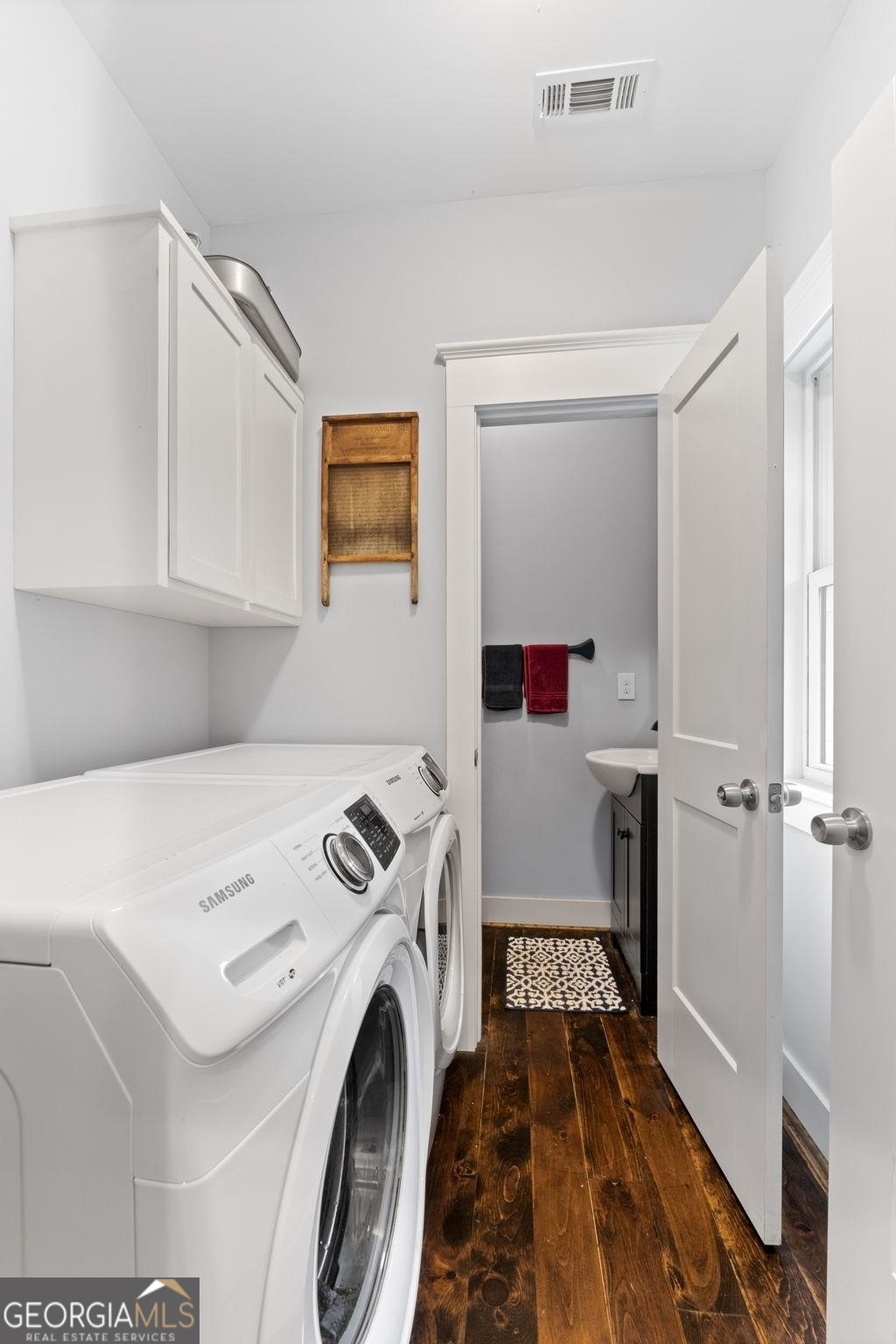 660 Doe Lane Mansfield, GA 30055 - Photo 16 of 45 a utility room with dryer and washer