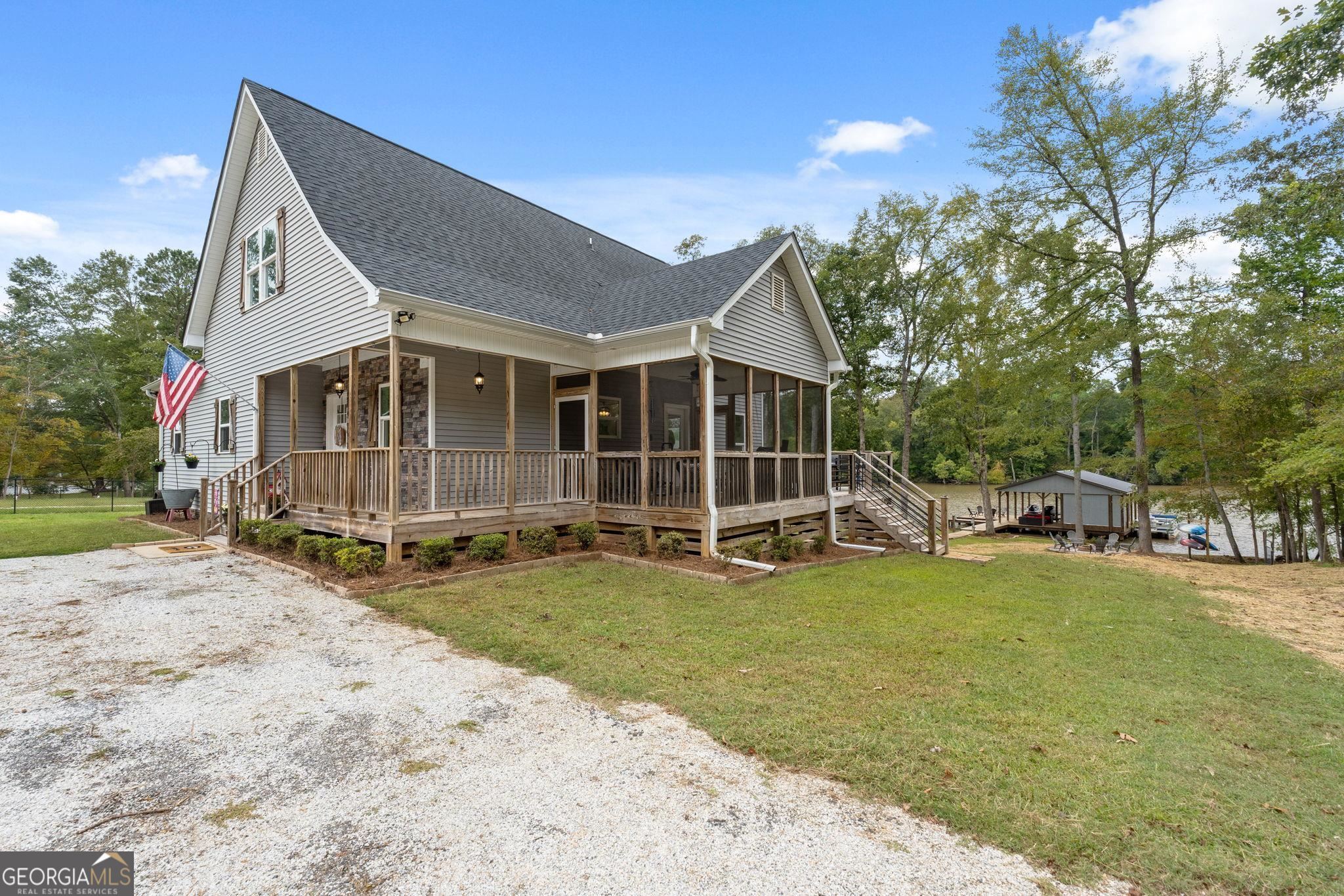 660 Doe Lane Mansfield, GA 30055 - Photo 2 of 45 a view of a house with swimming pool and sitting area
