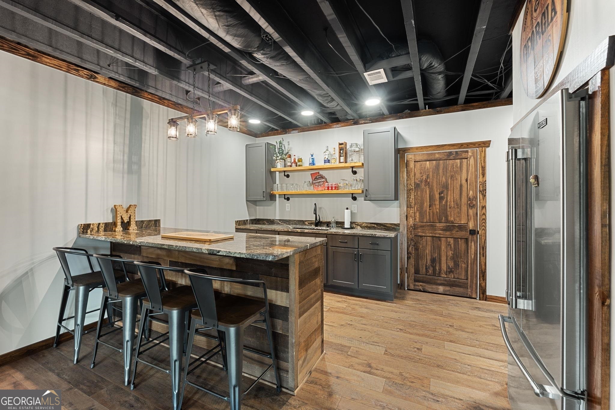 660 Doe Lane Mansfield, GA 30055 - Photo 23 of 45 a kitchen with a table and chairs in it