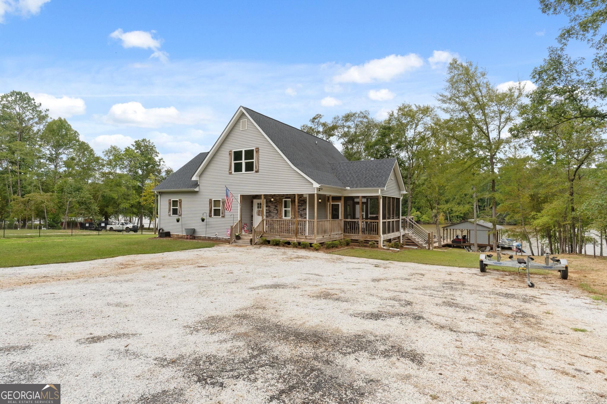 660 Doe Lane Mansfield, GA 30055 - Photo 32 of 45 a front view of a house with a yard