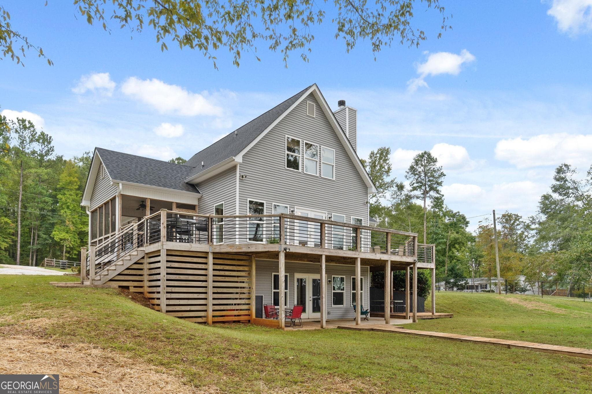660 Doe Lane Mansfield, GA 30055 - Photo 33 of 45 a view of a house with a yard