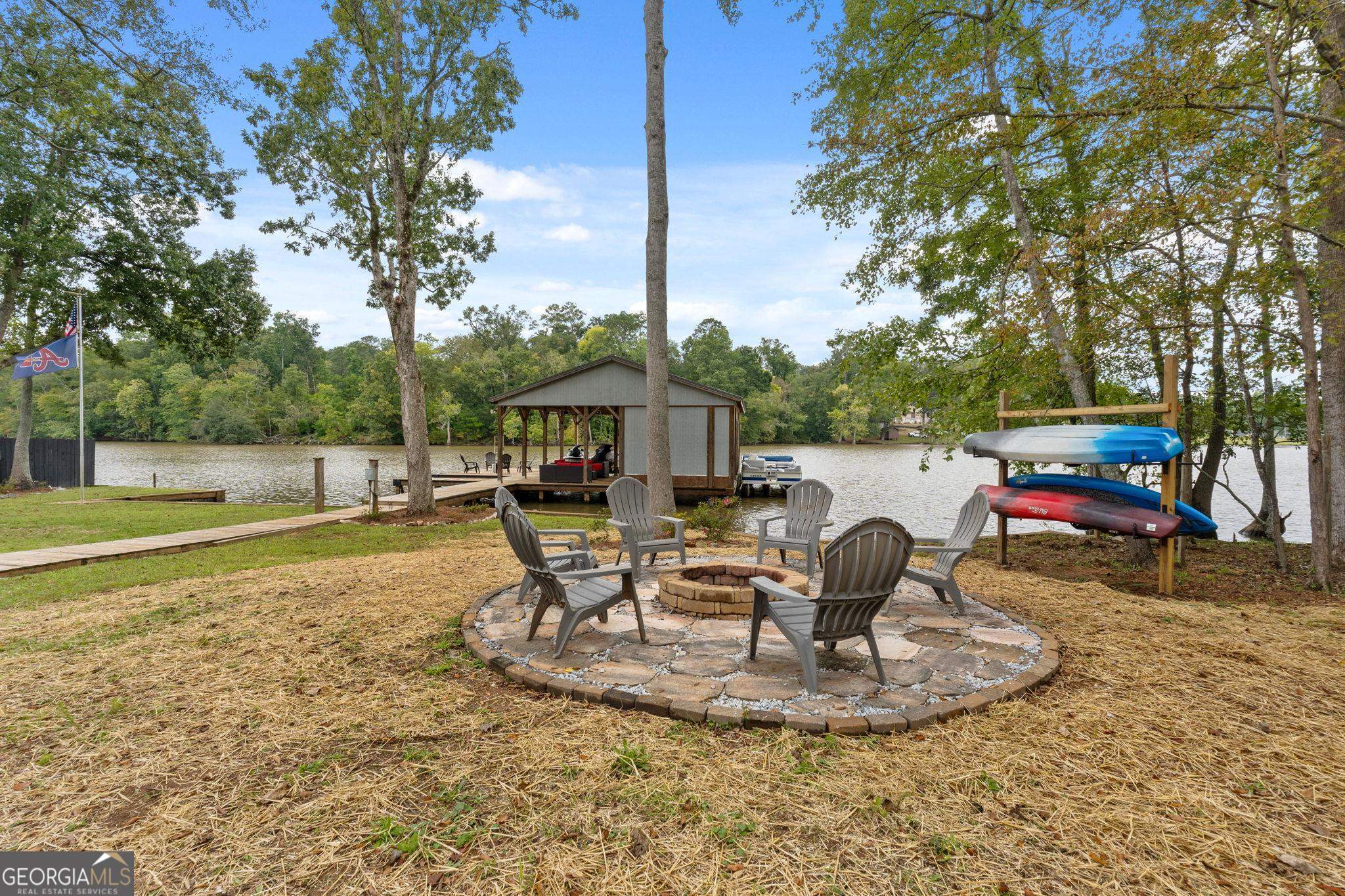 660 Doe Lane Mansfield, GA 30055 - Photo 35 of 45 a view of a swimming pool with sitting area