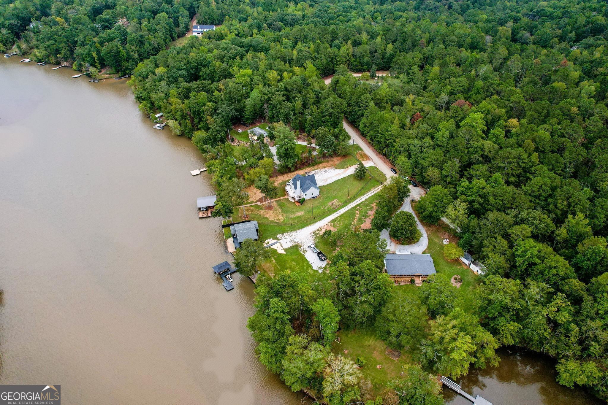 660 Doe Lane Mansfield, GA 30055 - Photo 45 of 45 an aerial view of a house with a yard and large trees