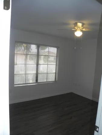 a view of a dinning table and chairs in the patio