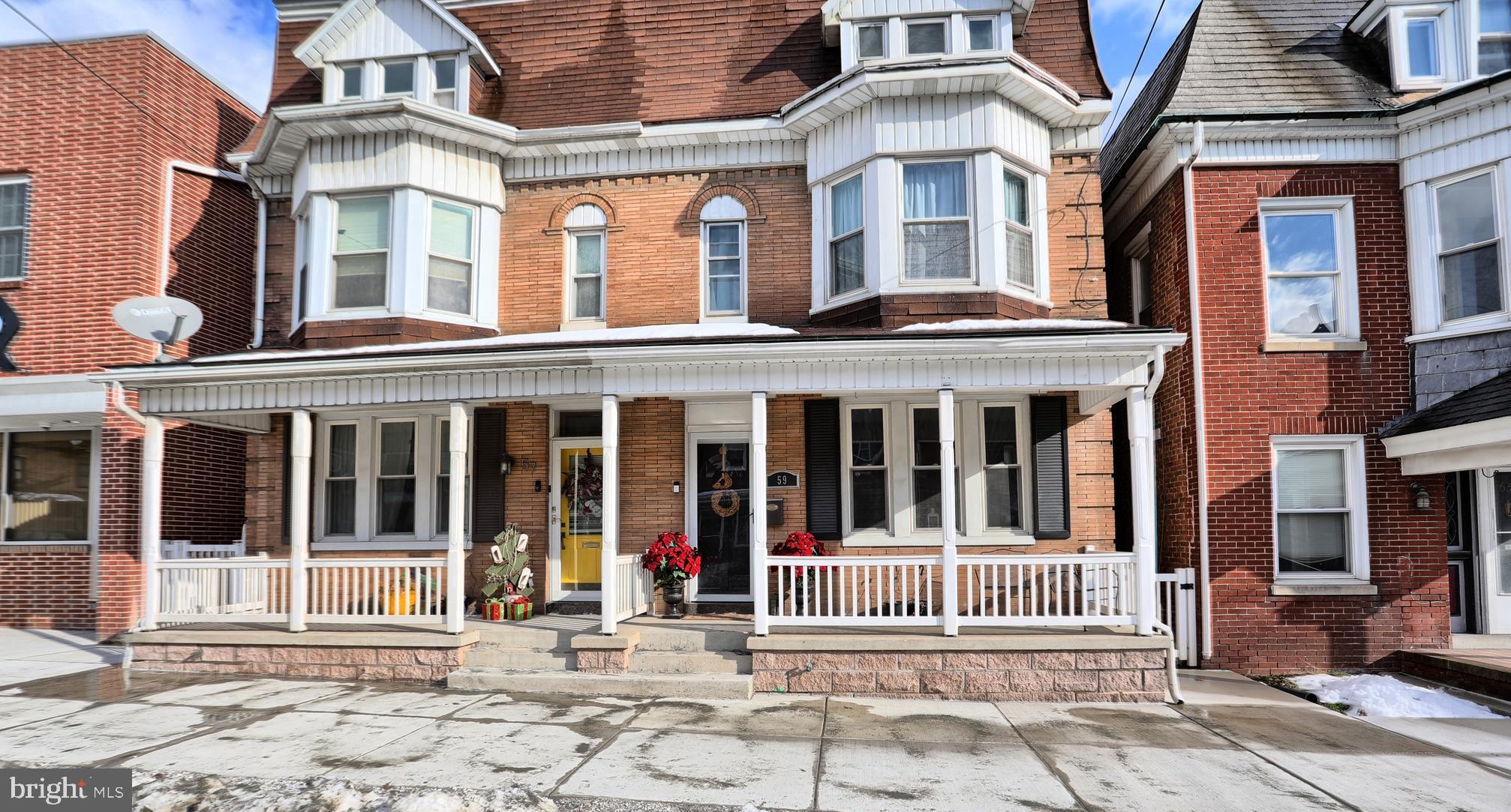 59 South Main Street Spring Grove, PA 17362 - Photo 2 of 50 front view of a brick building