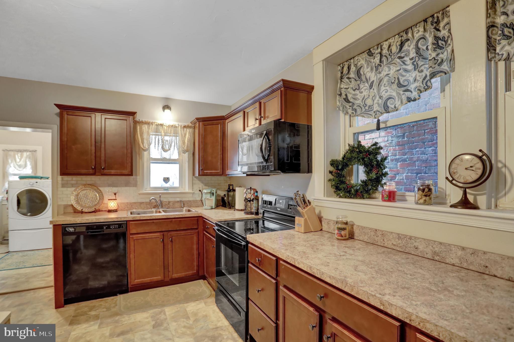 59 South Main Street Spring Grove, PA 17362 - Photo 15 of 50 a kitchen with a sink and cabinets