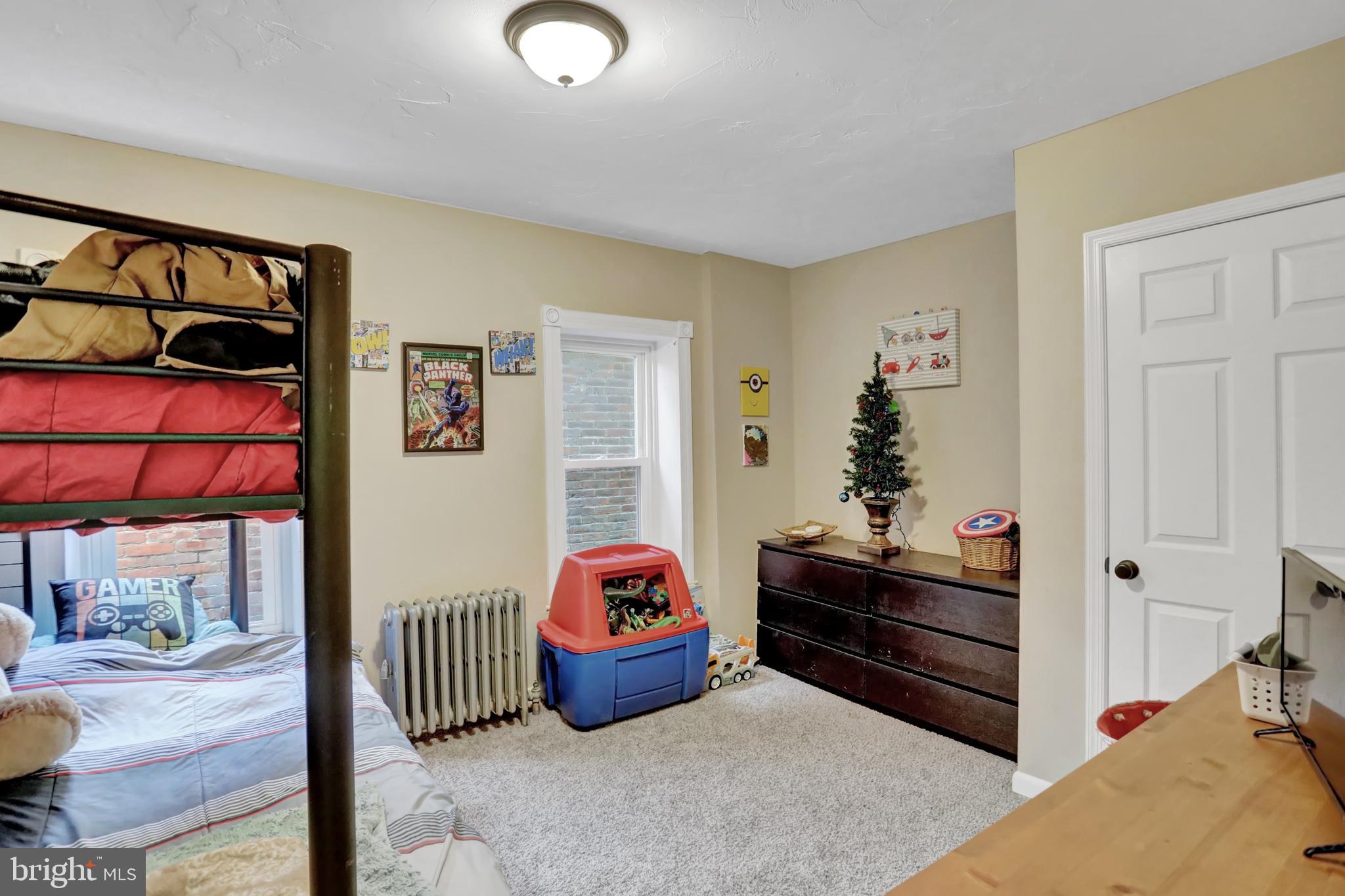 59 South Main Street Spring Grove, PA 17362 - Photo 25 of 50 a bedroom with bed and a window
