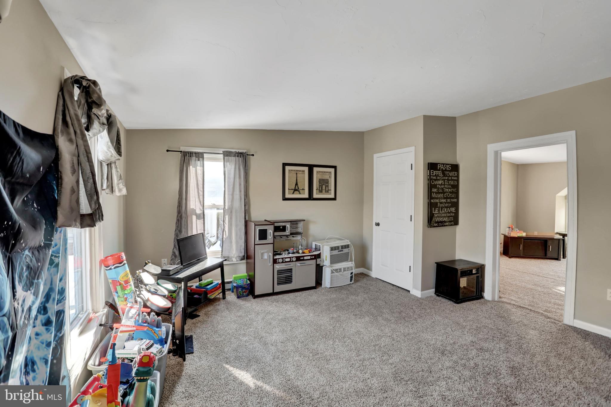 59 South Main Street Spring Grove, PA 17362 - Photo 30 of 50 a view of a livingroom with furniture and a flat screen tv