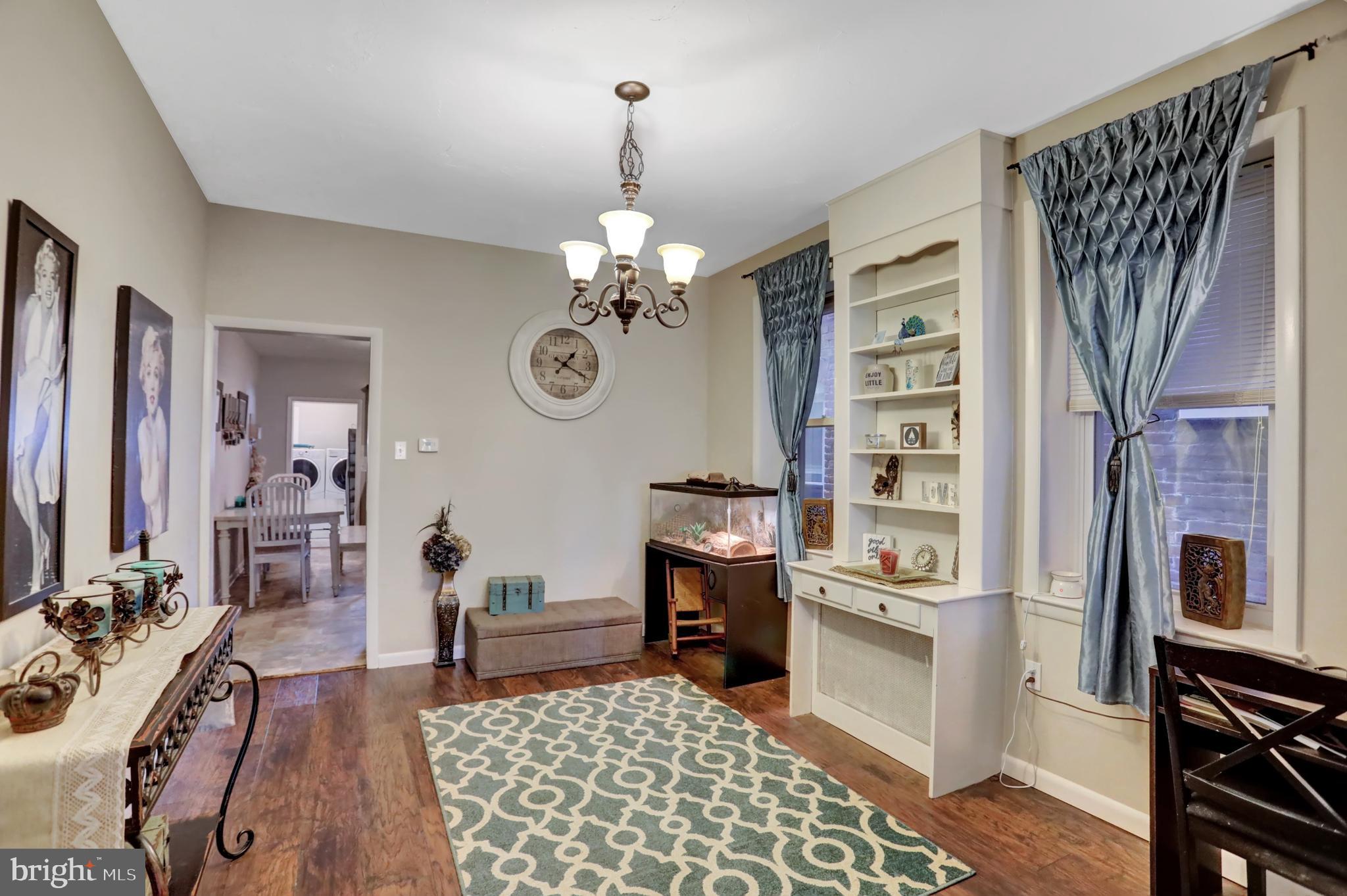 59 South Main Street Spring Grove, PA 17362 - Photo 9 of 50 a view of a dining room with furniture a rug and wooden floor