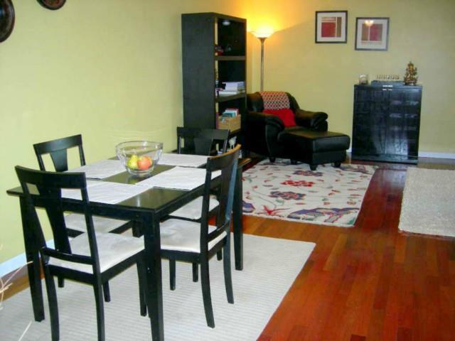 39 Glenbrook Road, Unit 3Z Stamford, CT 06902 - Photo 1 of 1 a view of a dining room with furniture and wooden floor