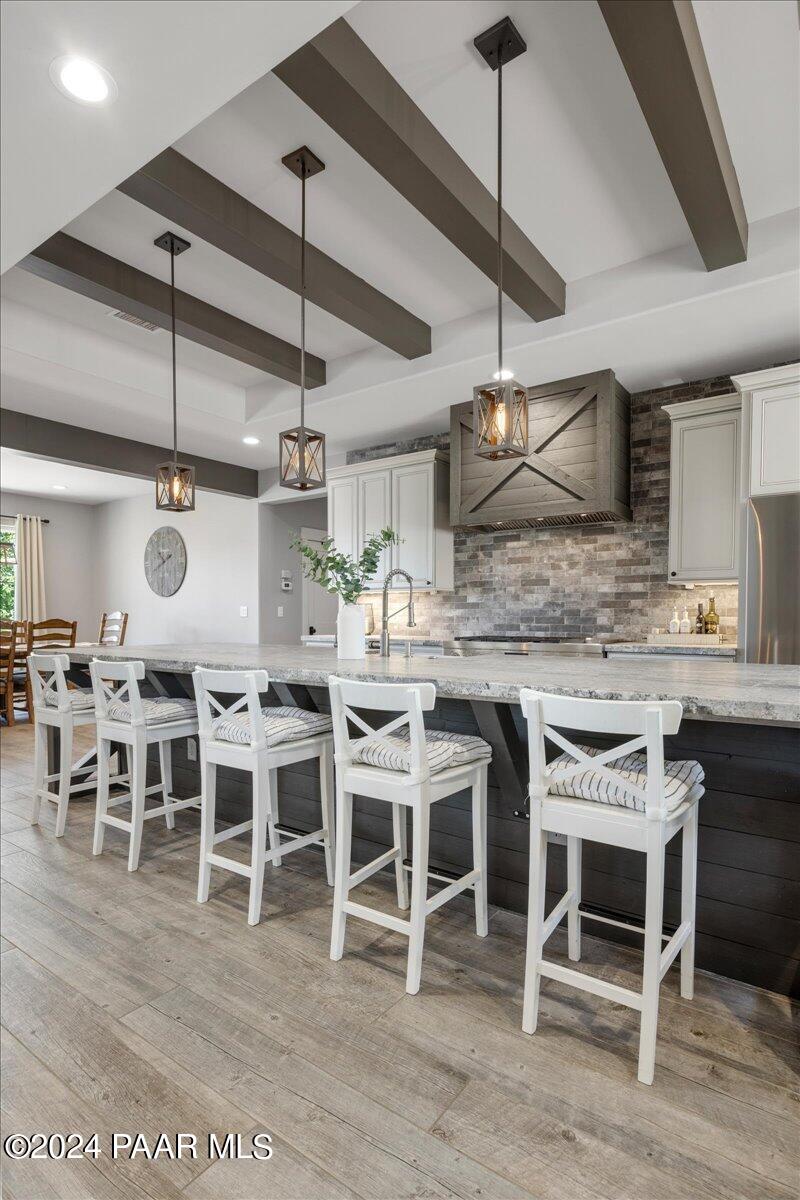 1947 Shadow Valley Drive Prescott, AZ 86305 - Photo 15 of 54 a open kitchen with a table and chairs