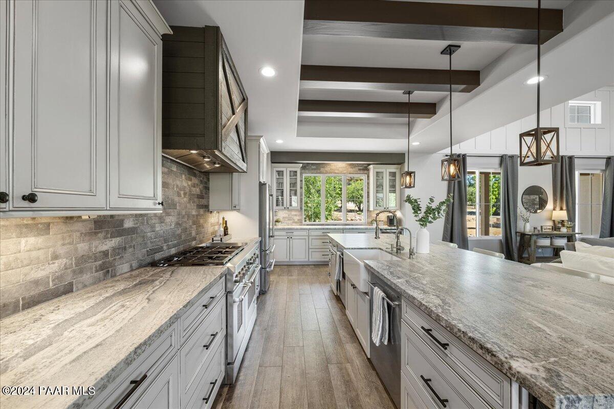 1947 Shadow Valley Drive Prescott, AZ 86305 - Photo 16 of 54 a kitchen with lots of counter top space and stainless steel appliances