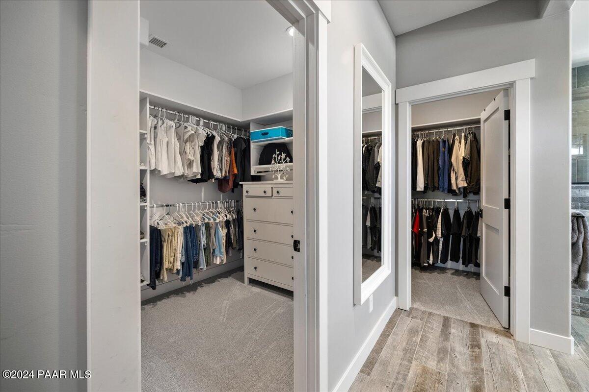1947 Shadow Valley Drive Prescott, AZ 86305 - Photo 23 of 54 a view of a hallway and closet with a fireplace