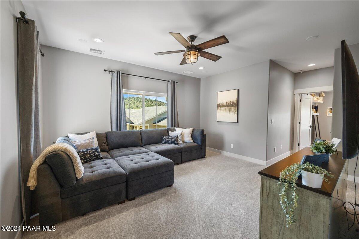 1947 Shadow Valley Drive Prescott, AZ 86305 - Photo 26 of 54 a living room with furniture and a window