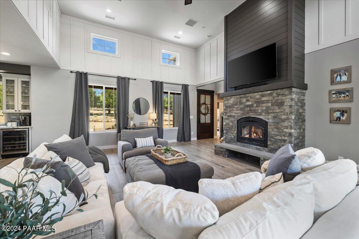 1947 Shadow Valley Drive Prescott, AZ 86305 - Photo 10 of 54 a living room with furniture fireplace and flat screen tv