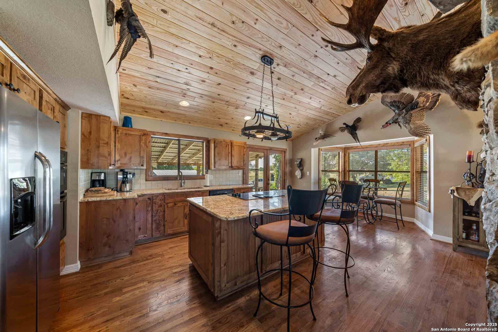 165 Flach Road Comfort, TX 78013 - Photo 35 of 69 a very nice looking room with kitchen view and furniture