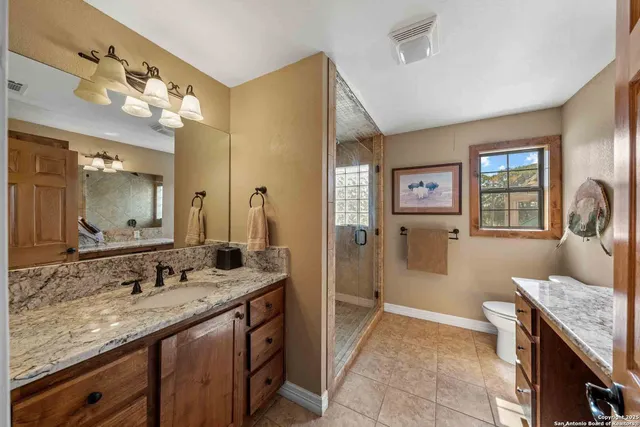 a view of a yard with large trees