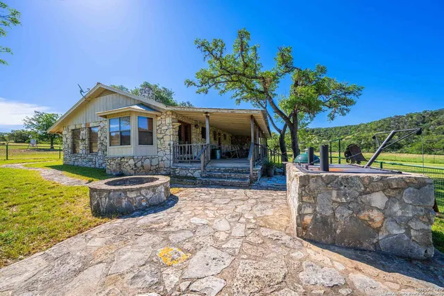 a view of a lake with houses in the background