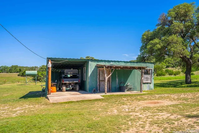 a view of a yard with an outdoor space