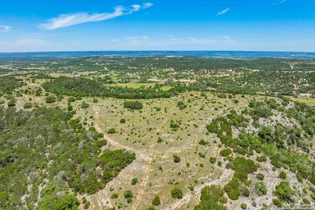 a view of lake with green space