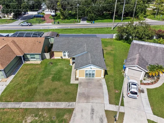 a view of swimming pool with a yard and seating area